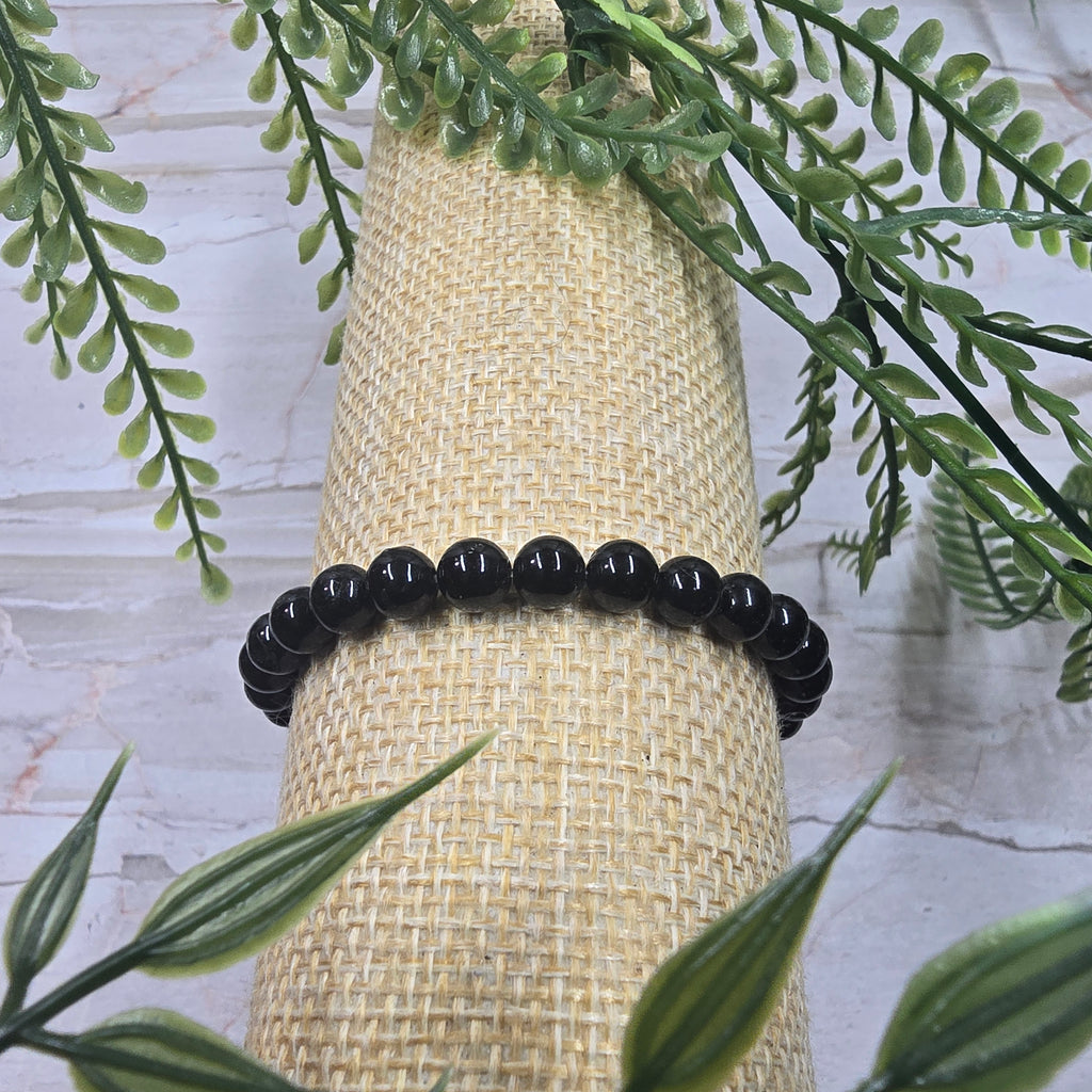 🌑✨ Bracelet élastique Obsidienne Argentée 6 mm – protection & clarté